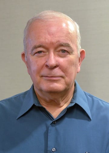 a headshot picture of Walt