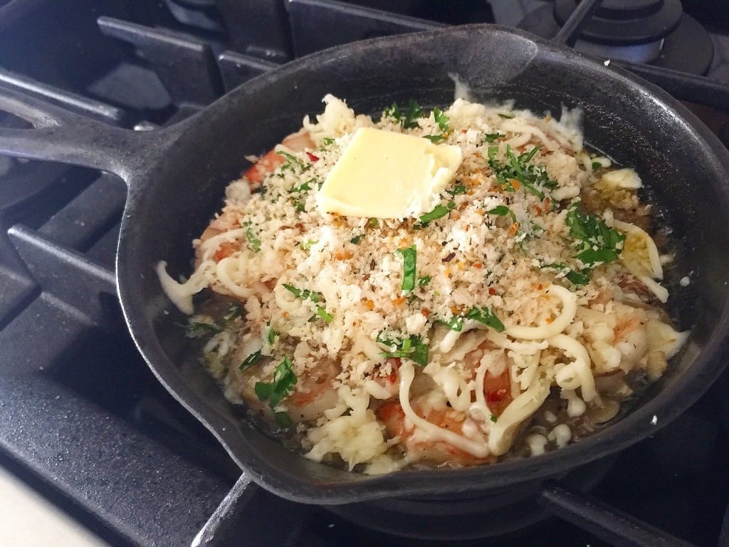 Cast Iron full of cooked shrimp
