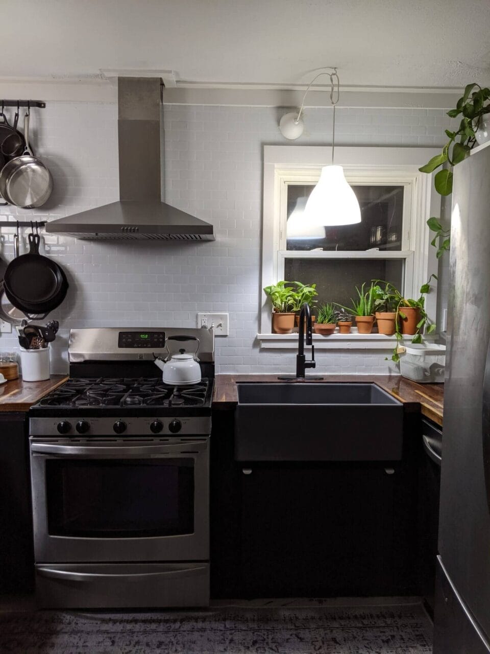 a gray fireclay kitchen sink in a small kitchen