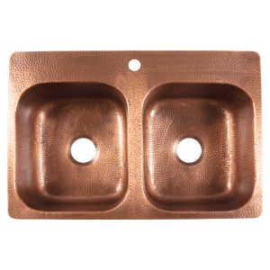 A copper rectangular drop-in double basin sink.