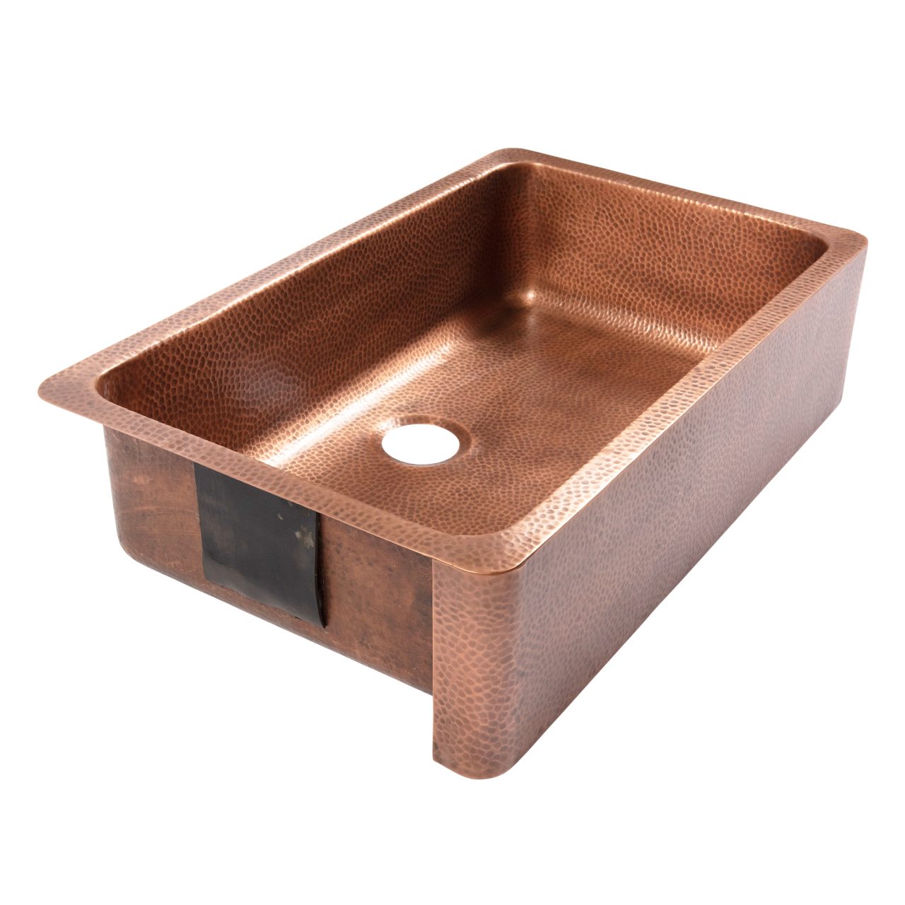 A copper rectangular undermount farmhouse sink.