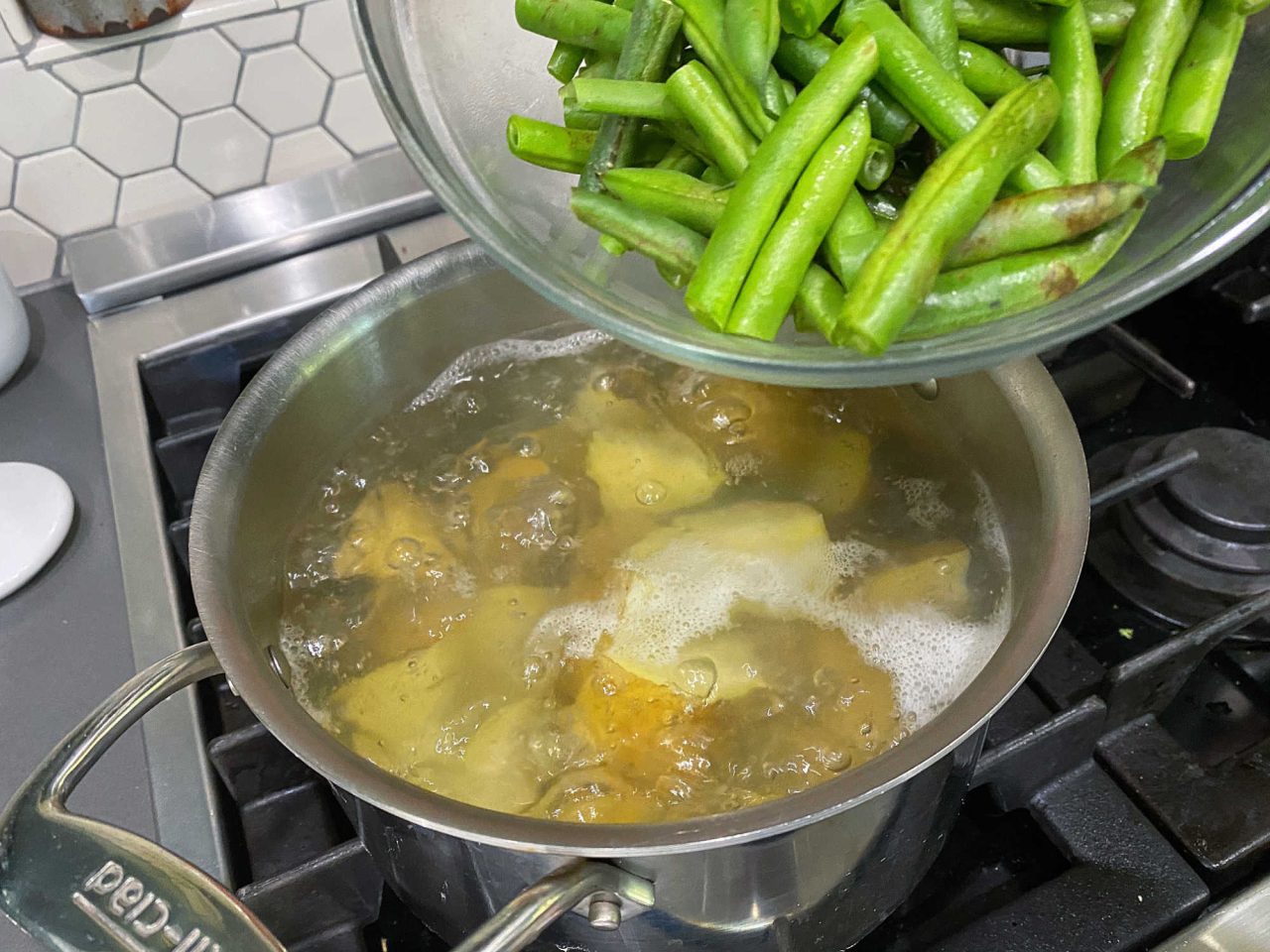 blowing potatoes on a stove