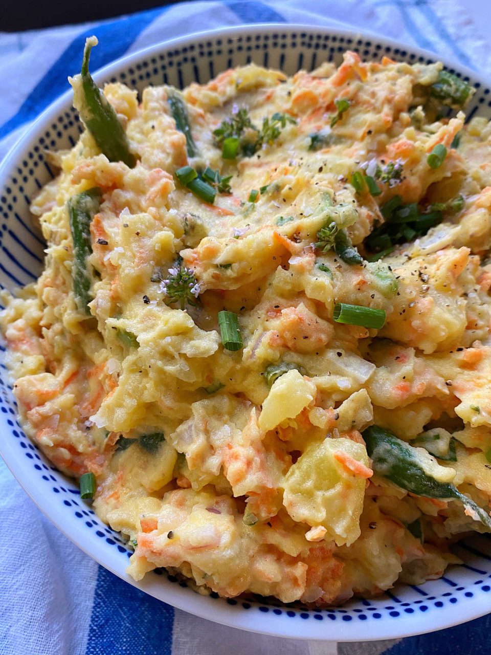 Warm veggies potato salad in a bowl
