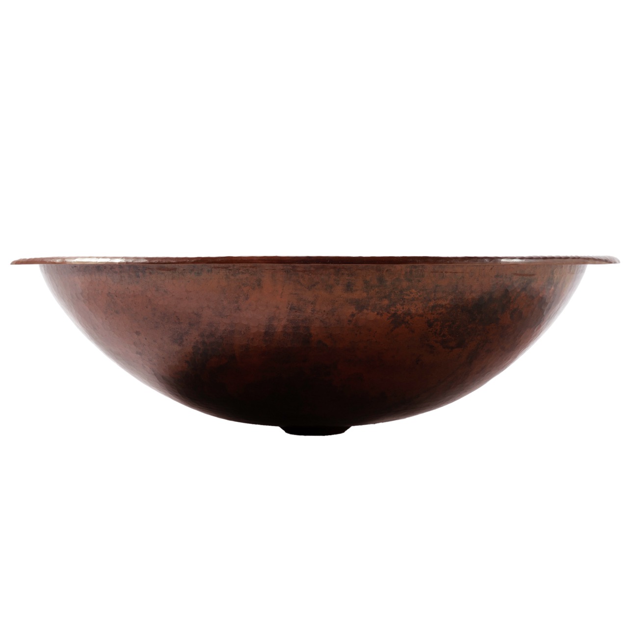 A hand hammered dual mount copper bathroom sink.