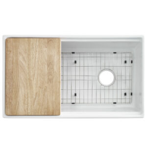 wooden cutting board in workstation sink